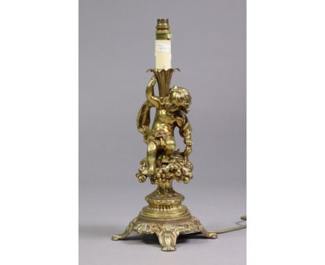 A brass figural table lamp base in the 19th century style, 18½” high x 8” wide.