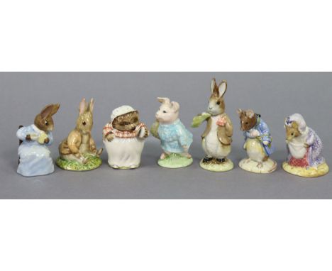 Seven Royal Albert Beatrix Potter character figures “Benjamin Ate A Lettuce Leaf”; “Benjamin Bunny Sat On A Bank”; “Cottontai