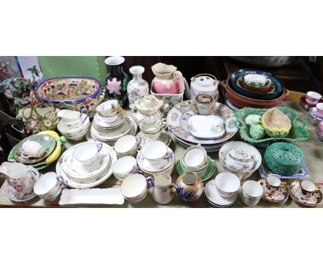 A court china floral decorated eighteen-piece part tea service; a crown Staffordshire floral decorated twenty-eight piece par