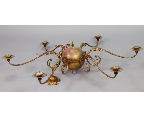 An Edwardian-style gilt-metal six-branch chandelier with a spherical centre, &amp; with scroll-arms, 48” wide x 30” high.