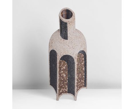 Stoneware, painted with an optical architectural design of archways in brown and sponged light brown glazes front and back, p