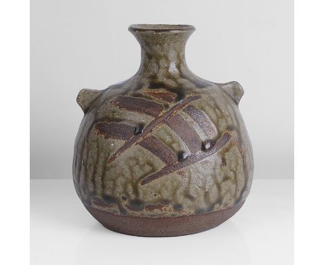 Stoneware, dark olive green running glaze over a dry iron body with finger wipes to front and back, impressed JL and Leach Po