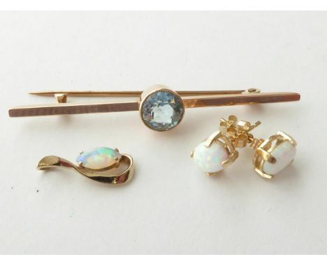 An Aquamarine Bar Brooch, unmarked, length 5.7cm; A 9 Carat Gold Opal Pendant; and A Pair of Opal Earrings, unmarked.  Gross 