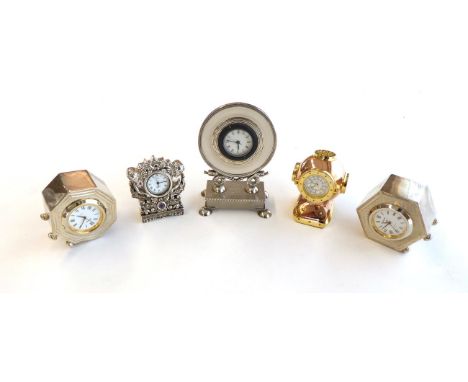 Five Various Silver and Other Timepieces, comprising: two hexagonal silver mounted examples, on bun feet, by Philip Kydd, Bir
