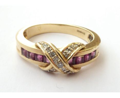 A 14 Carat Gold Ruby and Diamond Ring, finger size P1/2. Gross weight 5.07 grams