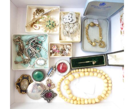 A Paste Set Stick Pin; A Gilt Metal Fob Chain; An Enamel Mourning Brooch (a.f.); An Amethyst and Seed Pearl Brooch, unmarked;