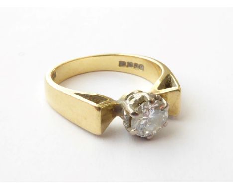 An 18 Carat Gold Diamond Solitaire Ring, finger size K.  Gross weight 4.6 grams. 