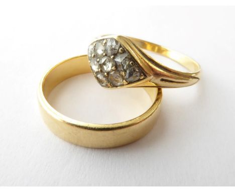 An 18 Carat Gold Band Ring, finger size K; and A Diamond Cluster Ring, finger size M1/2.  Band ring - 3.2 grams. Diamond ring