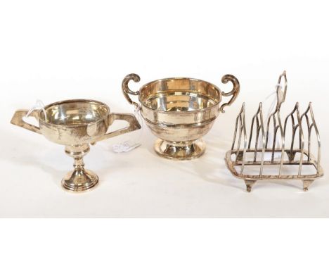An Edward VII Silver Toast-Rack and Two Cups, The Toastrack by William Hutton and Sons, Sheffield, 1904, with five bars and o