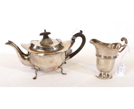 An Edward VII Silver Teapot and Cream-Jug, The Teapot by Williams (Birmingham) Ltd., Birmingham, 1904, oval and on four pad f