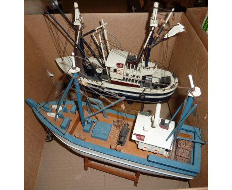 Two wooden model boats