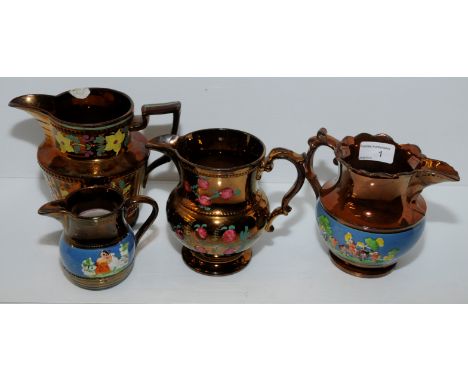 Four copper lustre jugs with enamel painted decoration