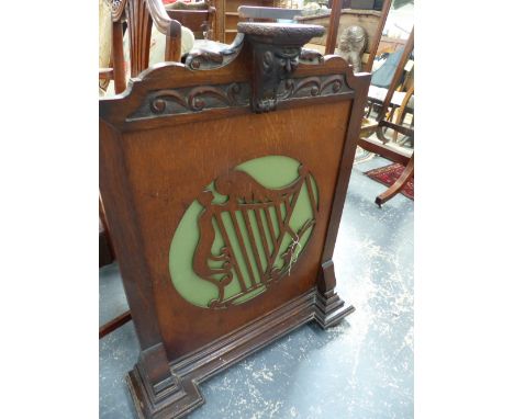 AN OAK FIRESCREEN.