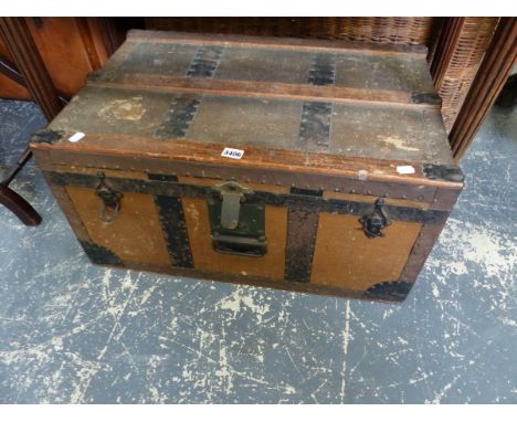 A VINTAGE TRAVEL TRUNK.
