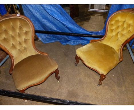 A NEAR PAIR OF BUTTON BACK SHOW FRAME NURSING CHAIRS.