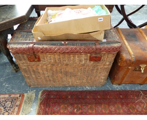 A LARGE WICKER HAMPER.