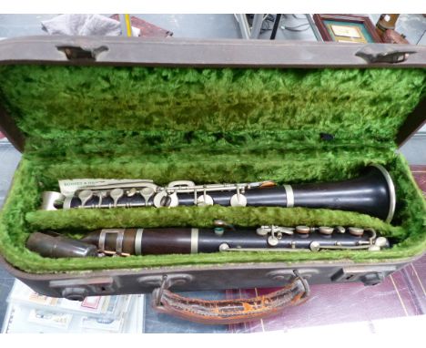 A CASED CLARINET.