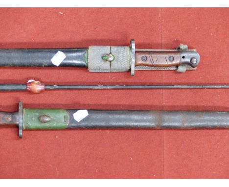 TWO WILKINSON CASED SWORDS AND A RIDING CROP. 