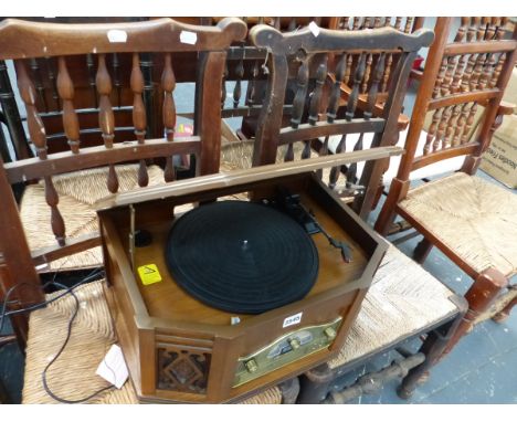 A VINTAGE STYLE RECORD PLAYER.