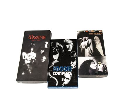 The Doors Box Sets, three CD Box Sets comprising Sneaking Out The Back Door (7 CD set plus Book), The Doors (4 CD set plus Bo