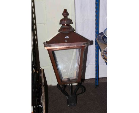 Copper and glazed driveway lamp hood.
