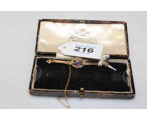Attractive seed pearl and amethyst set 9 carat gold bar brooch with safety chain.