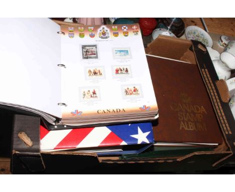 Five albums including USA stamp album dating 1883 to circa 1990's with a green two cent George Washington, blue two cent Benj