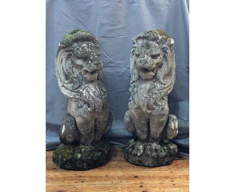 Pair weathered garden lions sitting upright, 61cm.