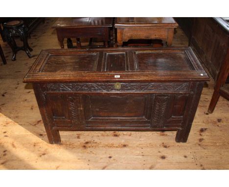 Antique carved oak triple panel front coffer, 65cm by 119cm.