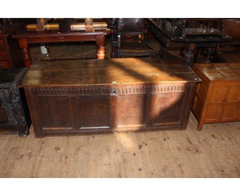Antique oak four panel front coffer, 55.5cm by 157cm.