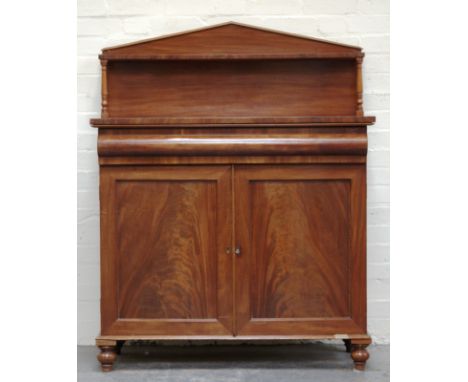 Victorian mahogany chiffonier, raised back with a shelf, rounded front frieze drawers, over two panelled doors, 104cms.