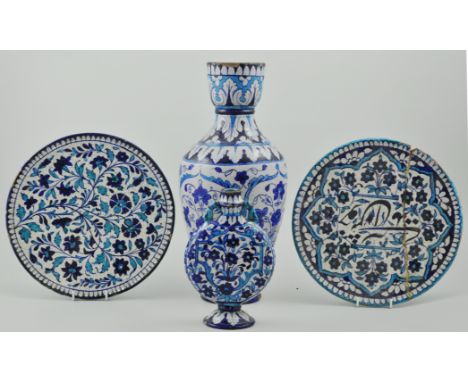 Indian Multani ware vase (a.f.), a moon flask and two plates (4).