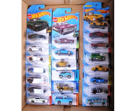 A large collection of approximately x28 carded Mattel made Hot Wheels diecast model cars to include; 65 Ford Ranchero, 64 Imp