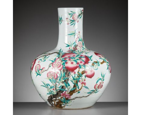 A FAMILLE ROSE 'NINE PEACHES' VASE, TIANQIUPING, LATE QING DYNASTY TO REPUBLIC PERIODChina, 19th to early 20th century. The v