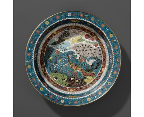 A LARGE 'BIRDS WORSHIPPING THE PHOENIX' CLOISONNE BASIN, MING DYNASTYChina, 16th to early 17th century. The interior exquisit