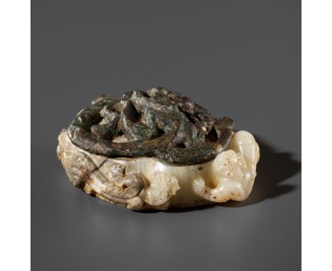 A 'CHILONG' JADE WEIGHT, EMBELLISHED WITH A GILT-BRONZE 'DRAGON' PLAQUE, HAN DYNASTYChina, 2nd century BC - 2nd century AD. T