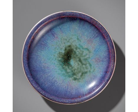 A JUN-TYPE FLAMBE-GLAZED DISH, CHINA, 18TH CENTURYOpinion: The beautiful glaze that transitions from a deep purple at the rim