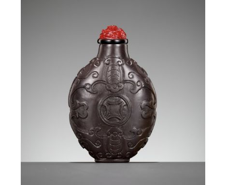 A DUAN STONE 'BATS AND CASH COINS' SNUFF BOTTLE, 1760-1860China. Of flattened oval form, supported on a short foot ring, risi