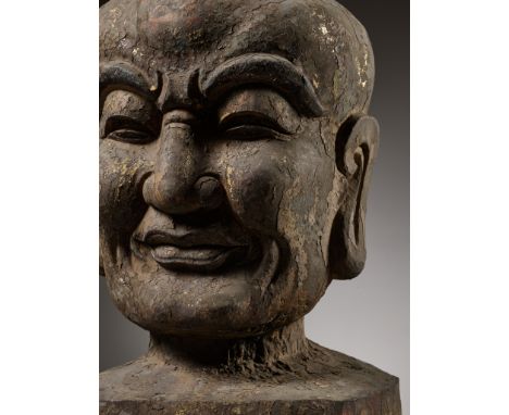 A RARE WOOD HEAD OF A LUOHAN, SONG DYNASTYChina, 960-1279. Superbly carved with a gentle contemplative expression, marked by 