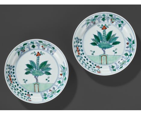 A RARE PAIR OF DOUCAI 'POMEGRANATE AND FOLIAGE' DISHES, YONGZHENG MARKS AND PERIODChina, 1723-1735. Each dish is delicately p