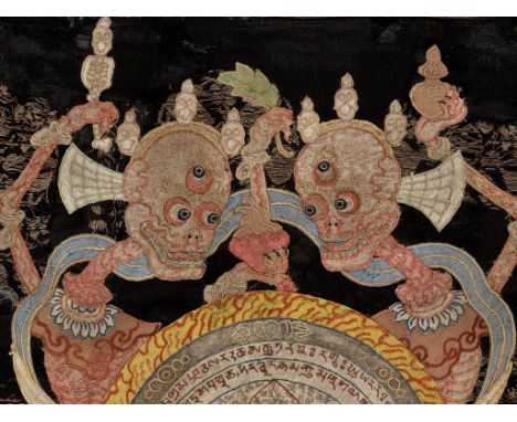 A SILK APPLIQUE THANGKA OF A CHITIPATI YANTRA, MONGOLIA, 19TH CENTURYFinely woven with two skeletons standing in unity on con