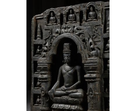 A MAGNIFICENT BLACK STONE STELE DEPICTING AN ENSHRINED VAIROCANA, PALA PERIOD, NORTHEASTERN INDIA, 11TH-12TH CENTURYExpert's 