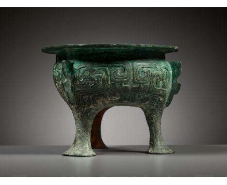 AN ARCHAIC BRONZE RITUAL FOOD VESSEL, LI, LATE WESTERN ZHOU DYNASTYExhibited: According to label 'Univ Museum Exhibition C10 