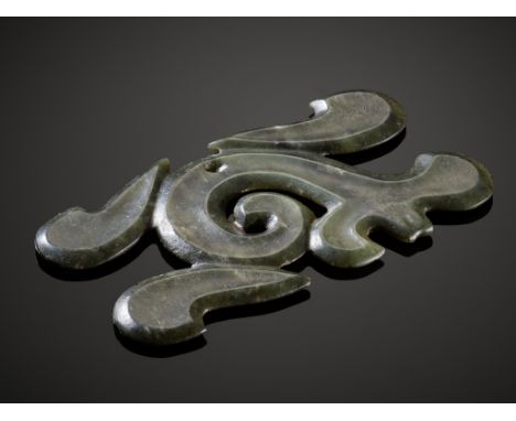 A GREEN JADE 'CLOUD-SCROLL' PENDANT, GOUYUN, HONGSHAN CULTUREChina, c. 4000-3000 BC. Carved in openwork in the form of a styl