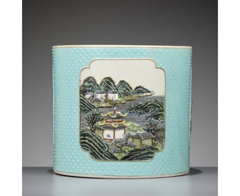 AN ELABORATELY MOLDED AND RETICULATED FAMILLE ROSE BRUSHPOT, BITONG, REPUBLIC PERIODChina, 1912-1949. The sides decorated wit