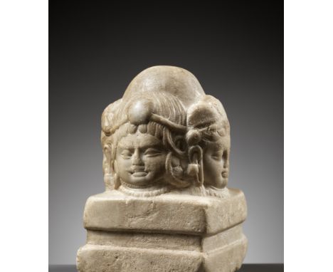 A RARE MARBLE LINGA WITH FOUR FACES, PANCHAMUKHALINGA, HINDU SHAHINorthwestern India, c. 8th century. Finely carved with four