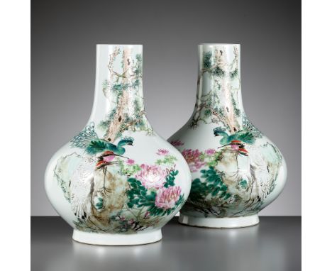 A PAIR OF 'QIANJIANG CAI' ENAMELED 'PEACOCK AND CRANE' VASES, BY MA QINGYUN, DATED 1920China. Each of bottle form with bulbou