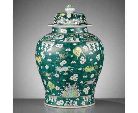 A FAMILLE VERTE 'GALLOPING HORSES' BALUSTER JAR AND COVER, LATE QING DYNASTYChina, 19th century. Of stoutly potted baluster f