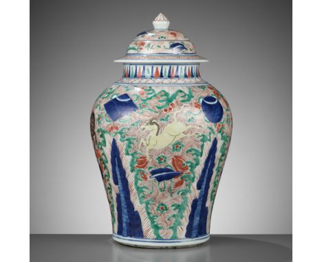 A WUCAI GLAZED 'HEAVENLY HORSES' BALUSTER JAR AND COVER, TRANSITIONAL PERIODChina, c. 1640-1660. Of baluster form, the broad 