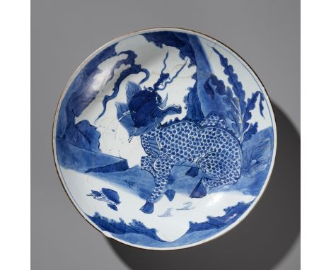 A LARGE BLUE AND WHITE 'QILIN' DISH, TRANSITIONAL TO EARLY KANGXI PERIODExpert's note: The 'Dexin Tang zhi' inscription to th